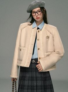 Elevate your wardrobe with our Classic Tweed Cropped Jacket. This beige button-front blazer boasts frayed edges and a sophisticated gold logo pin. Made from high-quality tweed fabric, it exudes elegance and adds a touch of luxury to your outfits. Stay stylish and professional with this timeless piece.  Model info: Height: 166 cm, Weight: 45 kg, Size worn: S Preppy Core, Tweed Cropped Jacket, Logo Pin, Jacket Beige, Jumpsuit Jacket, Tweed Fabric, Woolen Coat, 5 S, Gold Logo