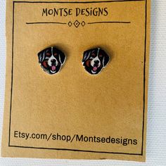 "This cute Bernese Mountain earrings makes the perfect gift for someone who loves dogs in general. It's hand made with my original illustrations. It will delight any dog owner and lover. I have designed different styles for you to chose. Unique gift for Bernese Mountain lovers. Ordering Instructions: Can be made as pin, magnet, reel badge, needle minder and/or key chain. Please let me know in your order your preference. Since this is a handmade product pieces are very similar but not identical. Personalized Adjustable Earrings For Gift, Adjustable Personalized Earrings As Gift, Novelty Jewelry Gift Set With Matching Earrings, Black Novelty Jewelry For Gifts, Cute Earrings For Mother's Day Gift, Cute Black Earrings As A Gift, Cute Black Earrings For Gift, Cute Black Earrings For Gifts, Cute Black Earrings For A Gift