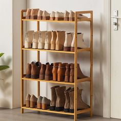 PRICES MAY VARY. [💕4 TIER ADJUSTABLE BOOTS RACK WOOD💕] If your husband collects boots, or your wife collects ankle boots, the adjustable boot rack fits all his/her boots and the rest of the family’s shoes. You get different heights, great from shoes to tall boots.This is a great entry way piece, then fill with all the shoes you need! [👏EASY TO INSTALLATION👏] Boot rack are quick and easy to assemble. but one tip is to only hand tighten the screws at first until it’s all assembled and then go Wooden Shoe Rack, Modern Organization, Bamboo Shoe Rack, Boot Rack, Wooden Shoe Racks, Bamboo Shelf, Shoe Storage Shelf, Shoe Rack Organization, Wood Rack