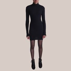 HANDMADE IN THE UK: Style: Turtle Neck Mini Dress Colour: Black Stretch Properties: Stretchy Ribbed Jersey  Model Size: Size UK 4/EU 32 Models Height: 165cm/5:5 Main Fabric: 100% Organic Combed Cotton As I handmake all products to order, I can offer customisation on the length of the dress. Please measure from the shoulder neck point to the length you desire.  NOTE: This dress is a slimmer fit than the turtle necks. All fabric is pre-shrunk. However, you may still experience a small amount of sh Black Stretch Knee-length Mini Dress, Black Micro-elastic Athleisure Tights, Casual Black Micro-elastic Tights, Black Micro-elastic Seamless Tights, Black High-neck Mini Dress In Elastane, Black Turtle Neck, Mini Robes, Classic Dress, Black Stretch