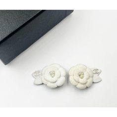 Chanel Silver CC Ivory Camellia Flower Clip on Earrings  *Marked 05 ( One of the stamps is missing.) *Made in France *Comes with the original box  -It is approximately 1.25" x 0.9". -Very classic and super cute -It is in an excellent condition. Camellia Flower, Flower Clip, Clip On, Made In France, Clip On Earrings, The Original, Original Box, Chanel, Super Cute