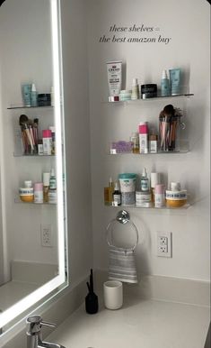 a bathroom sink sitting under a mirror next to a shelf filled with cosmetics and personal care items