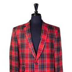 This Chiragh Apparel blazer is an elegant upgrade on dapper tailoring and features rich shades in a sumptuous fabric for elegant opulence. Fashioned from premium quality wool, this tartan plaid blazer features full lining in Japanese silk, a notch lapel, two-button closure and single-vented back. A left chest pocket and three flap pockets appoint the front while the inside has two (2) pockets on the left and one (1) pocket on the right. A flash of contrast piping is added to the jacket lining in Luxury Red Blazer With Lapel Collar, Classic Red Long Sleeve Tweed Jacket, Luxury Red Single Breasted Blazer, Elegant Red Tweed Jacket For Winter, Luxury Red Single-breasted Blazer, Red Luxury Single-breasted Blazer, Elegant Custom Fit Red Suit, Red Single Breasted Long Sleeve Tweed Jacket, Elegant Red Suits For Fall