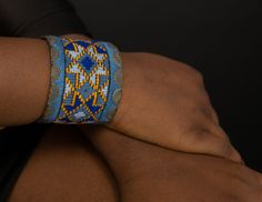 Geometric Cuff Embroidered Bracelet for Women, Textile Blue Background, Boho Bracelet, Bracelet for Women Stylish bracelet with soothing color of Blue that you can easily match with your outfit. It will surely add to your style. The bracelet is hand made needle work with 100% natural thread, all environmentally friendly material (100% cotton and brass, NO plastic) for people that we share our concern about environment with. One item takes days and days of needlework. The artistic patterns inspir About Environment, Artistic Patterns, Embroidered Bracelet, Paisley Art, Geometric Star, Stylish Bracelet, Boho Bracelet, Bracelet Boho, Needle Work