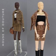 two mannequins dressed in plaid outfits and high heeled boots, one wearing a black crop top