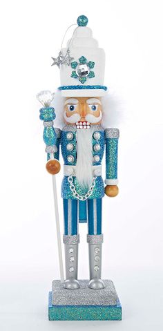 a blue and white nutcracker figurine with a hat on it's head