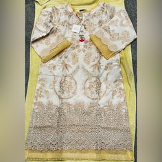 Pakistani 3 Piece Beautiful Dress Fitted White Festive Dress, Festive White Fitted Dress, White Dress For Eid Festivities, White Dress For Festive Eid Occasion, Elegant Sleeveless Dresses For Eid, White Long Sleeve Dresses For Festive Occasions, Festive White Long Sleeve Dresses, White Embroidered Lawn Suit For Formal Occasions, Formal White Embroidered Lawn Suit