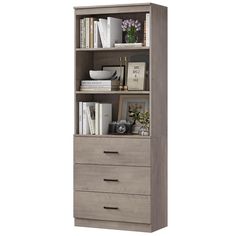 an open bookcase with drawers and books on the bottom shelf, in grey oak finish