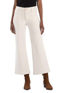 Cropped at the ankles for a fresh look, these stretchy wide-leg jeans feature a sleek wash and seamed front. 27" inseam; 23" leg opening; 10 1/2" front rise; 15" back rise (size 8) Zip fly with button closure Front patch pockets; back patch pockets 98% cotton, 2% spandex Machine wash, tumble dry Imported Mid-rise Cream Cotton Bottoms, Cream Cotton Mid-rise Bottoms, Mid-rise Cream Jeans With Pockets, Mid-rise Cream Denim Bottoms, White Mid-rise Flare Jeans In Cotton, Women Formals, Women Clothing Boutique, Ladies Boutique, Leg Jeans