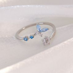 📌 Please Note: When adjusting the ring, please squeeze or expand the ring body slowly and gently. 💎 Materials: 14k White Gold Electroplated - more durable than regular platings Cubic Zirconia 📐 Size: Adjustable Open Design - Size 5+ Blue Butterfly Ring, Silver Butterfly Ring, Butterfly Ring, Silver Butterfly, Tony Awards, Open Design, Back To School Outfits, Diamond Crystal, Blue Butterfly