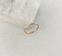 Minimal and dainty 14k gold filled band that is made with tiny flat beads. Each bead is approx. 2mm Perfect on its own or as a stacker. A must have in the ring collection. Dainty 14k Gold Filled Stackable Rings, Dainty 14k Gold Filled Midi Rings With Round Band, Dainty 14k Gold Filled Midi Rings, Minimalist Stackable 14k Gold-filled Toe Rings, Minimalist 14k Gold-filled Stackable Toe Rings, Minimalist 14k Gold Filled Stackable Toe Rings, Minimalist 14k Gold-filled Midi Toe Rings, Minimalist 14k Gold Filled Midi Toe Rings, Adjustable 14k Gold Filled Stackable Rings