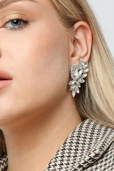 You deserve to be a princess for your day. ⬇️ Shipping takes; 2-4 days to USA 1-3 days to EU 2-5 days to rest of the world.  PRODUCT DESCRIPTION👇 These Jewelry Furtek earrings are the epitome of fashion and style. Their combination of crystal stone and rhinestone creates a stunning look that is both trendy and elegant. The crystal stone sparkles in the light, adding a touch of sophistication to your outfit. The rhinestones are strategically placed to enhance the overall design, creating a piece of jewelry that is sure to turn heads. Whether you're attending a formal event or just running errands, these earrings are the perfect accessory to add some cool to your look. Not only are they fashionable, but they are also very comfortable to wear. The stretchy design means that they will fit com Glamorous Cluster Earrings With Sparkling Stones For Anniversary, Diamond White Drop Earrings For Party, Diamond White Drop Cluster Earrings For Party, White Crystal Embellished Earrings For Anniversary, Glamorous White Crystal Earrings With Diamond Accents, Glamorous Diamond White Crystal Earrings For Anniversary, Crystal Cluster Earrings For Parties, Party Crystal Cluster Earrings, Silver Cubic Zirconia Earrings For Glamorous Events