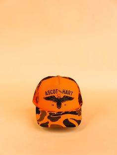 Teaching an old yet perfect trucker hat new color tricks with the popular Ascot + Hart eagle logo trucker now available in a variety of fun, new shades! Teal Hat, Shirt Photography, T-shirt Photography, Orange Camo, Hat Base, Color Picker, Eagle Logo, Green And Khaki, Color Khaki