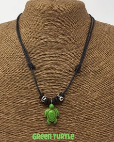 Handmade Turtle Necklace Adjustable Black Cord - Pull the knots to adjust - Fits Most Size Unisex Necklace Order this today or browse our incredible selection of Turtle Accessories. Fast Shipping! Peace and Love. At Artisans Hall you will find a variety of Turtle Necklaces and Turtle Bracelets. Click Here https://www.etsy.com/shop/TheArtisansHall to see more Turtle designs Black Jewelry With Adjustable Chain For Beach, Casual Adjustable Necklaces With Sliding Knot, Casual Adjustable Necklace With Sliding Knot, Casual Green Jewelry With Adjustable Length, Casual Green Adjustable Jewelry, Casual Green Adjustable Necklace, Turtle Accessories, Hawaiian Turtle, Sea Turtle Necklace