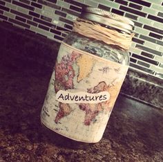 a glass jar with the words adventures written on it