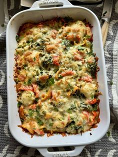 a casserole dish with broccoli and cheese