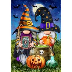 two halloween gnomes are sitting in the grass with their pumpkins and an old fashioned caulder