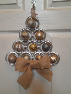 a christmas tree made out of metal ornaments