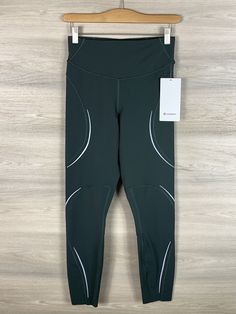 Lululemon Base Pace HR Reflective Tight 25" Size 8 Smoked Spruce SKSR 53185 121522C3 Condition is New With Tags. Shipped with USPS. Will combine shipping on multiple purchases and refund any shipping overage. Free Mind, Active Wear Pants, Running Tights, Brands Outlet, Active Wear, Outfit Inspirations, Tights, Shoe Accessories, Size 4