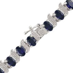 This 6.0 x 4.0mm oval lab-created blue sapphire and diamond accent cascading bracelet set in sterling silver measures 7.0 inches in length and secures with a tongue and groove clasp. Blue Oval Sapphire Diamond Bracelet, Elegant Sapphire Diamond Bracelet With Oval Shape, Elegant Oval Sapphire Diamond Bracelet, Blue Oval Diamond Bracelet For Anniversary, Elegant Sapphire Tennis Bracelet With Oval Shape, Blue Oval Diamond Bracelet With Gemstone, Oval Sapphire Bracelets For Anniversary, Elegant Sterling Silver Bracelet With Oval Gemstone, Elegant Sterling Silver Oval Gemstone Bracelet