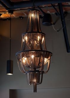 a chandelier hanging from the ceiling in a room