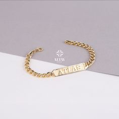 ABOUT PRODUCT  This 14K Gold ID Chain Cuban Link Bracelet is suitable gift for girlfriend, mom and her. You can even buy as a birthday gift for your friends or anniversary gifts, If you want to add a special note we can write for you and put to inside of package. We manufacture our jewelry pieces with carefully and after production we double checking in quality control department. Our main idea is keep our items for daily wearing especially for minimalist jewelry pieces. You can wear this chain bracelet in your daily activities. It's shining enough to effect to other people and perfect fitting on wrist. It will be perfect layering jewelry on your wrist. 14K Gold ID Bracelet, Cuban Link Nameplate Bracelet, Custom Initial Engraved Bar, Custom Name Bracelet, Personalized Gift For Her Him, Uni Rectangular Engraved Gold Bracelet Gift, Elegant Name Bracelets With Rectangular Shape, Elegant Rectangular Bracelets With Name Detail, Elegant Rectangular Name Bracelets, Gold Engraved Wristband For Gift, Elegant Personalized Silver Wristband, Personalized Elegant Silver Wristband, Gold Wristband With Bracelet Strap As Gift, Elegant Gold Wristband As Gift