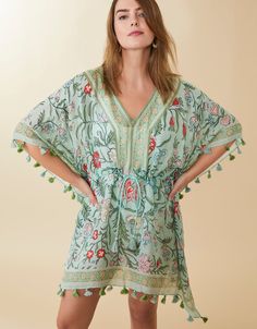 With such a beautiful floral block pattern, we might as well call this a show-off! Accented with fluttering tassel trim, this flowy, V-neck pullover easily cinches to fit with a tasseled drawstring. Floral Block Print, Tassel Belt, Spartina 449, Block Pattern, Woman Beach, Tassel Fringe, Beach Covers, Pattern Blocks, Block Print