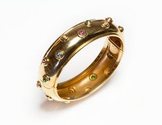 Paloma Picasso Tiffany Co. Gold Gemstone Bangle-Bracelet Luxury Bangle With Gemstone Accents, Jeweled Yellow Gold Bracelets For Formal Occasions, Yellow Gold Jeweled Bracelets For Formal Occasions, Yellow Gold Jeweled Bracelet For Formal Occasions, Formal Yellow Gold Jeweled Bracelets, Luxury Jeweled Yellow Gold Bracelets, Fine Jewelry Yellow Gold Multi-stone Bangle, Yellow Gold Multi-stone Bangle In Fine Jewelry Style, Jeweled Yellow Gold Bangle Bracelet