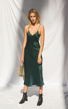 LIKE the boots with this feminine slip dress for fall/winter Silk Laundry '90s emerald silk slip dress #silk-clothingfemininity