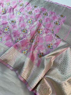 This is a very beautiful high quality mashru silk saree . All over zari motifs design with border . Saree length - 5.5 mtr. Blouse - 1 mtr. Dry clean only . Please note - color may be vary a little due to sunlight and photography . Please message us after purchasing in case you want fall and Pico done it not . No extra charges for fall and Pico but inform us . Blouse stitching is also available . Pink Zari Weaving Dola Silk Saree, Pink Dola Silk Saree With Zari Weaving, Silk Pink Saree For Eid, Pink Dola Silk Dupatta With Zari Weaving, Dola Silk Saree With Traditional Patterns, Semi-stitched Pink Katan Silk Traditional Wear, Traditional Dola Silk Saree With Patterns, Traditional Drape Dola Silk Saree With Patterns, Pink Semi-stitched Katan Silk Traditional Wear