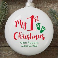 a personalized christmas ornament hanging from a tree