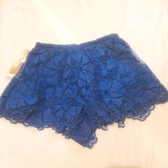 F21 Blue Knit Shorts Featuring A Floral Design. Never Worn. Blue Spring Sleep Shorts, Blue Floral Print Beachwear Shorts, Floral Denim Shorts, Forever 21 Summer Bottoms With Built-in Shorts, Forever 21 Blue Cotton Mini Skirt, Forever 21 Blue Cutoff Shorts, Chiffon Shorts, Beige Plaid, Satin Shorts