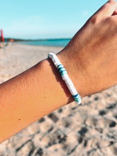 Sunkissed Sandbanks  ✨ This Beach Surfer Style bracelet is perfect for all your summer endeavours. It is handmade of polymer clays beads which are known to be quite durable. ✨ SIZING: Each bracelet measures around 6.5 inches which fits great for most teens and adults. However please contact me if you would like a custom length!  💌 FREE SHIPPING! - Through Canada Post Oversized Lettermail Feel free to message me with any questions, I will typically respond within 24 hours. I'm a teen who makes a Tiny Beads Bracelets For Summer Beach, Summer Beach Bracelets With Tiny Beads, Adjustable Heishi Bead Strand Bracelets, Beaded Bracelets For Summer Beach Party, Summer Friendship Bracelets With Tiny Beads For Vacation, Beaded Bracelets For Beach Party In Summer, Casual Beaded Bracelets With Tiny Beads For Beach Season, Casual Tiny Beads Bracelets For Beach Season, Summer White Hand-strung Friendship Bracelets