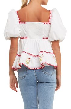 Colorful embroidery brings whimsical charm to a peplum top framed by a sweetheart neck and voluminous puff sleeves. Sweetheart neck Short sleeves Lined 100% cotton Hand wash, dry flat Imported White Puff Sleeve Top With Floral Embroidery, Fitted White Peasant Top With Square Neck, Embroidered Square Neck Top For Summer, White Feminine Puff Sleeve Top With Square Neck, White Peasant Top With Smocked Bodice And Puff Sleeves, White Puff Sleeve Top With Smocked Bodice, White Feminine Peasant Top With Ruffles, White Puff Sleeve Embroidered Top For Summer, White Smocked Bodice Top With Square Neck