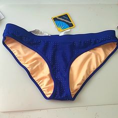 Nwt Fabletics Swim Bottoms. Perforated Blue With Nude Lining. Size M (Matching Top Is Also Listed For Sale) Blue Stretch Swimwear With Go-dry, Blue Stretch Swimwear For Training, Blue Seamless Swimwear For Training, Seamless Blue Swimwear For Training, Athletic Swim, Neon Bikinis, Swimming Swimsuit, Reversible Bikinis, Lingerie Outfits