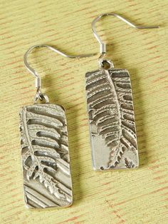 Eye-Catching Earrings With a Beautiful Hand-Cast Relief Pattern of Vermont Fiddleheads and Ferns Aluminium Jewellery, Fiddlehead Fern, Fern Earrings, Pewter Casting, Precious Metal Clay Jewelry, Classic Perfumes, Pewter Earrings, Woodland Earrings, Vermont Country Store