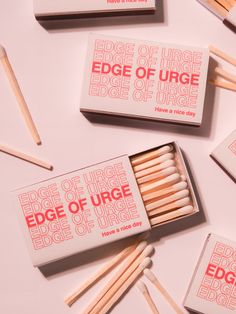 matches are laid out on a white surface with the words edge of urge printed on them