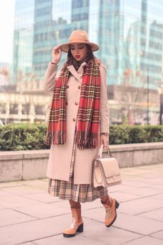 #FallFashionInspo #AutumnVibes #ChicFallStyle #BootSeason #FallEssentials #CasualFallOutfits #PlaidSeason #StreetStyleFall #CozyLayers Wearing Ankle Boots, Warm Scarves, Autumn Tones, Sleek Dress, Oversized Sweaters, Autumn Wardrobe, Statement Bag, Stylish Boots