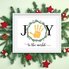 a christmas card with the words joy to the world and handprinted on it