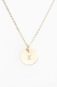 From humble beginnings to a fully staffed warehouse in Bend, Oregon, Nashelle remains true to its original purpose-handmade jewelry crafted with love and intention. The mini-initial necklace is no different, with a small hand-stamped pendant suspended from a delicate chain for a dainty effect. Style Name:Nashelle 14K-Gold Fill Initial Mini Circle Necklace. Style Number: 1016124. Available in stores. Blue Sapphire Necklace, Humble Beginnings, Heart Necklace Diamond, Diamond Necklace Set, Delicate Chain, Sapphire Necklace, Circle Necklace, Rose Gold Necklace, Diamond Heart