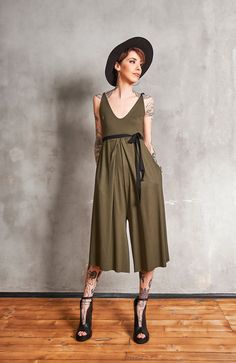 The perfect summer boho jumpsuit is here! Wide-leg pants, dripping around your figure like a waterfall and a looser style that will allow you to go anywhere in this beauty and feel comfortable. Its unique backless design will give you a chic and edgy look and you can adjust the fit at the waist with the subtle belt. It's a must-have for the new season! Be Love ♥♥ ♥ Material: Jarsey 90% viscose, 10% elastane ♥ Care Hand Wash / Dry Cleaning Machine 30oC / 104oF Max Do Not Tumble Dry Do Not Bleach Bohemian Jumpsuits And Rompers For Spring Party, Sleeveless Jumpsuits And Rompers For Festivals, Spring Festival V-neck Jumpsuit, Spring Festival V-neck Jumpsuits And Rompers, Casual Sleeveless Jumpsuits And Rompers For Festival, Green Bohemian V-neck Jumpsuits And Rompers, Bohemian Sleeveless Party Jumpsuit, Bohemian Sleeveless Jumpsuits For Party, Bohemian Sleeveless Party Jumpsuits And Rompers