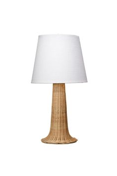 a table lamp with a white shade on it