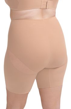 Comfortable, targeted compression sculpts the lower tummy, booty and upper legs in mid-waist shaping shorts that even work under low-back outfits. 8" inseam (size Medium) Firm compression Open gusset Moisture-wicking fabric Partially lined 75% nylon, 25% spandex Hand wash, line dry Imported Fitted Smoothing Tights Short Length, Fitted Shapewear With Smoothing Short Inseam, Fitted Smoothing Short Length Tights, Fitted Shapewear With Built-in Shorts, Mid-thigh Length, Fitted Shapewear With Built-in Shorts, Compressive High-cut Bottoms With Built-in Shorts, Fitted Shapewear Bottoms Above Knee, Compression Shapewear With Short Legs, Shaping Bottoms With Built-in Shorts Above Knee