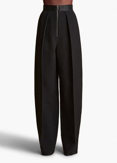 Designed to sit higher on the waist, this refined trouser is shaped by sharp, angled pleats and a bold zipper. Clean waistband in satin suiting. Suit Pant, Fit Inspo, Fitness Inspo, Trousers, Satin, Zipper, Pants, Black