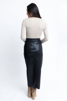 Our Pleather Cross Front Skirt is a stylish and fun addition to any wardrobe. Its cross front design and button detailing offer a unique and eye-catching look. With the added functionality of pockets, this skirt is not only fashionable but also practical. Elevate your outfit game with this must-have piece. Black High-waist Cargo Skirt For Work, High-waist Black Cargo Skirt For Work, Chic Fitted Cargo Skirt For Fall, Chic High Waist Cargo Skirt For Fall, Black High Waist Cargo Skirt For Work, High Waist Black Cargo Skirt For Work, Chic Asymmetrical Cargo Skirt For Work, Fitted Cargo Skirt With Button Closure, Chic Long Fitted Cargo Skirt