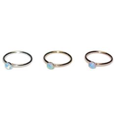 This is a very beautiful sterling silver opal nose ring. This modern and stylish piece of jewelry can add value to any outfit. It can be used for earlobe, cartilage, helix and tragus piercing as well. * The listing is for 1 (one) hoop. * Wire ends were rounded and polished to provide you with a smooth end for insertion. The earring was then polished. * Available inner diameters in millimeters (widths) for your ring: 7mm, 8mm, 9mm, 10mm * You can choose among variety of gemstones for this item. P Hypoallergenic White Gold Nose Rings, Hypoallergenic Round Opal Jewelry, Dainty Pierced Round Nose Rings, Sterling Silver Birthstone Piercings, Dainty Internally Threaded Nose Rings, Dainty Hypoallergenic Round Nose Rings, Dainty Nickel-free Small Hoop Rings, Hypoallergenic Dainty Round Nose Rings, Minimalist Round Ring