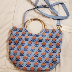 Nwt, Anthropologie, Llani Hailey Leather Crossbody Bag. Handcrafted, Botanical Blockprint In Blue & Orange. Metal Ring Handles. Removeable & Adjustable Strap. Inner Slip Pocket. Magnetic Snap Closure. *Stock Pictures Of The Purse In Ivory Are To Show Features. Blue Top Handle Shoulder Bag For Spring, Blue Tote Satchel For Spring, Blue Satchel With Detachable Handle For Spring, Blue Satchel For Everyday Spring Use, Blue Satchel For Daily Use In Spring, Blue Shoulder Bag With Detachable Handle For Spring, Spring Blue Shoulder Bag With Leather Handles, Blue Crossbody Bags For Spring, Blue Shoulder Bag With Leather Handles For Spring