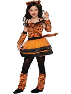 Your kid can take a walk on the wild side this Halloween with our Kid's Tiger Cub Costume. But that doesn't mean he or she has to look like a beast while doing so. In fact, this adorable set will do anything but that. It comes with the cutest little tiger striped dress that has an attached tail, a headband equipped with fuzzy ears, adorable sleevelettes, and leg warmers. Now, of that isn't the cutest thing you'll ever see, we don't know what is! Jungle Costume, Halloween Forum, Tiger Cub, Theatre Costumes, Costume Themes, In The Jungle, A Tiger, Tiger Stripes, Boys Jacket