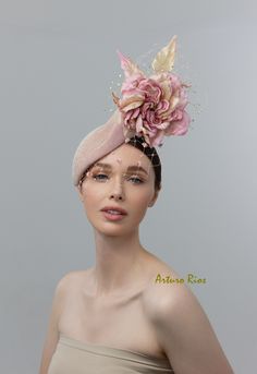 From my 2024 collection. Beautiful Rose gold fascinator made on a modern pillbox base, covered with a shimmery Rose gold silk chiffon fabric. A custom handmade Silk rose with leaves, Crystal stems and veil with vintage velvet dots. Elastic string attached. Luxury Pink Adjustable Headpieces, Elegant Rose Fascinator With Handmade Flowers, Elegant Rose Wedding Fascinator, Rose-colored Fascinator For Party, Rose Fascinator For Kentucky Derby Wedding, Rose Fascinator For Wedding And Kentucky Derby, Elegant Rose Party Hat, Elegant Rose Fascinator For Kentucky Derby, Elegant Blush Fascinator For Party