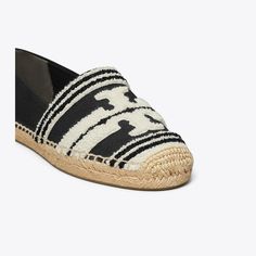 Mixed materials add texture and subtle dimension to the warm-weather essential. Crafted in canvas with woven terry and set on a jute sole, the Double T espadrille is a versatile and effortless style.